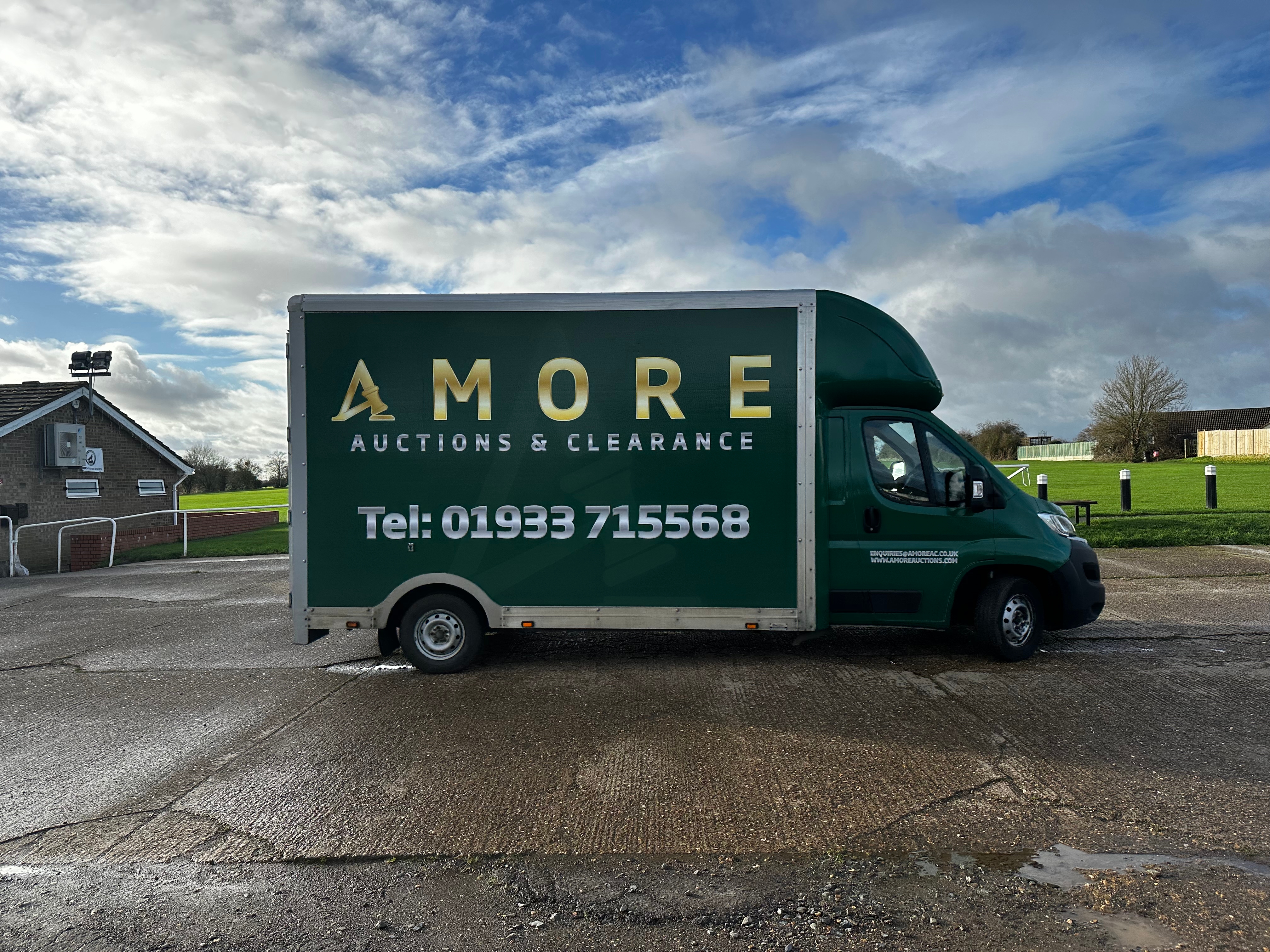 Amore Auctions And Clearance large green van